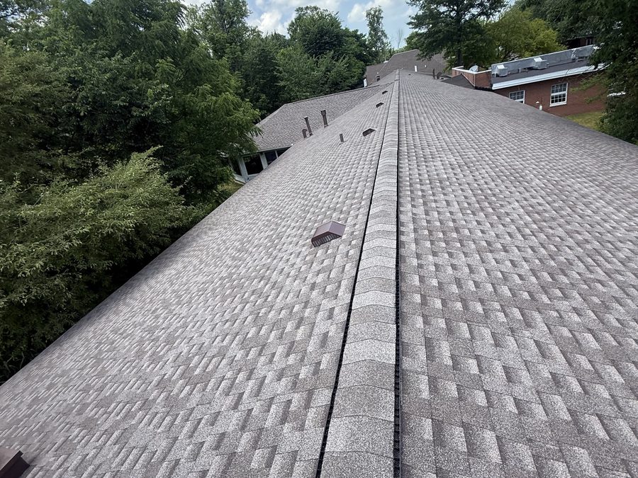 Completed commercial roof restoration with fresh shingles in Northeastern Ohio